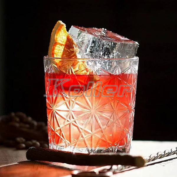 a cocktail with transparent ice cube