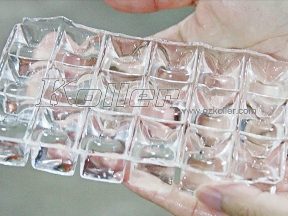 a hand holding ice cube