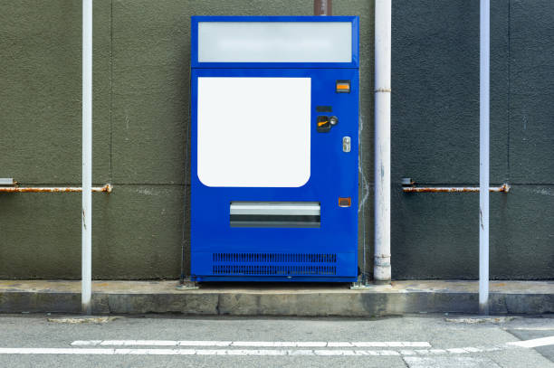 Empty white shelves of standard office vending machine